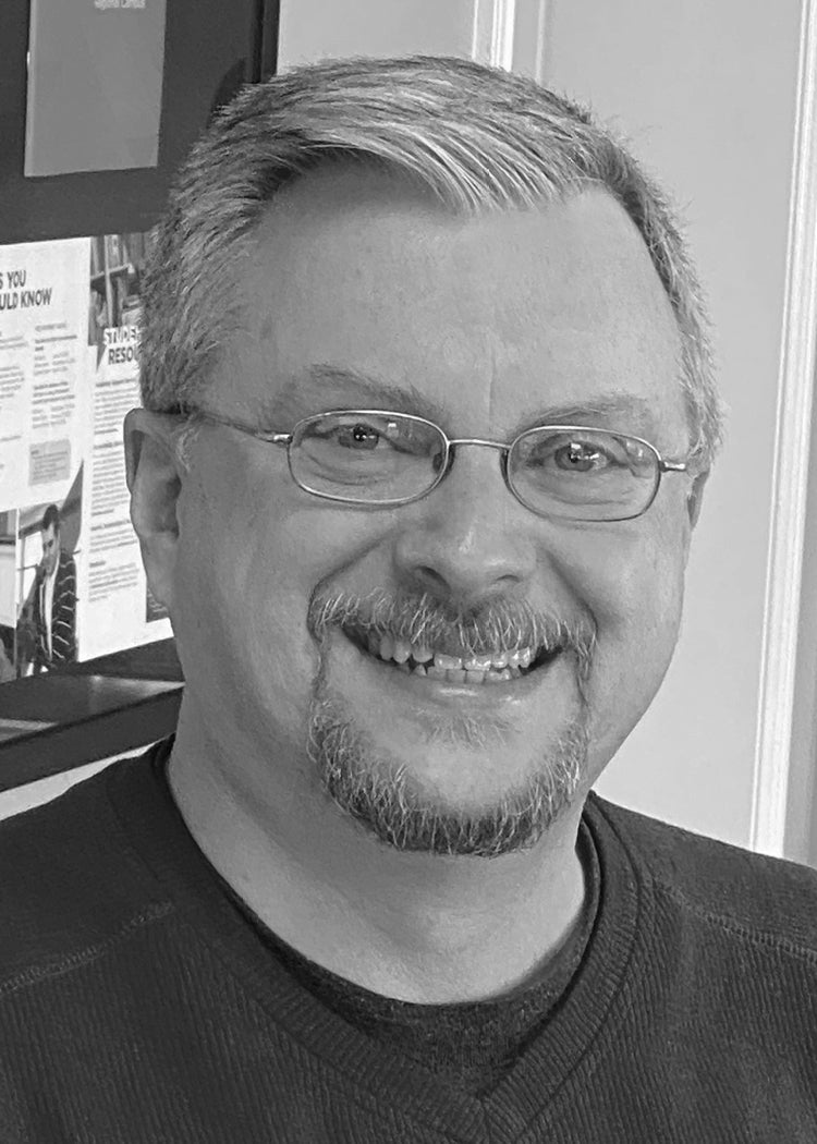 Headshot of a man named Dan Carter.