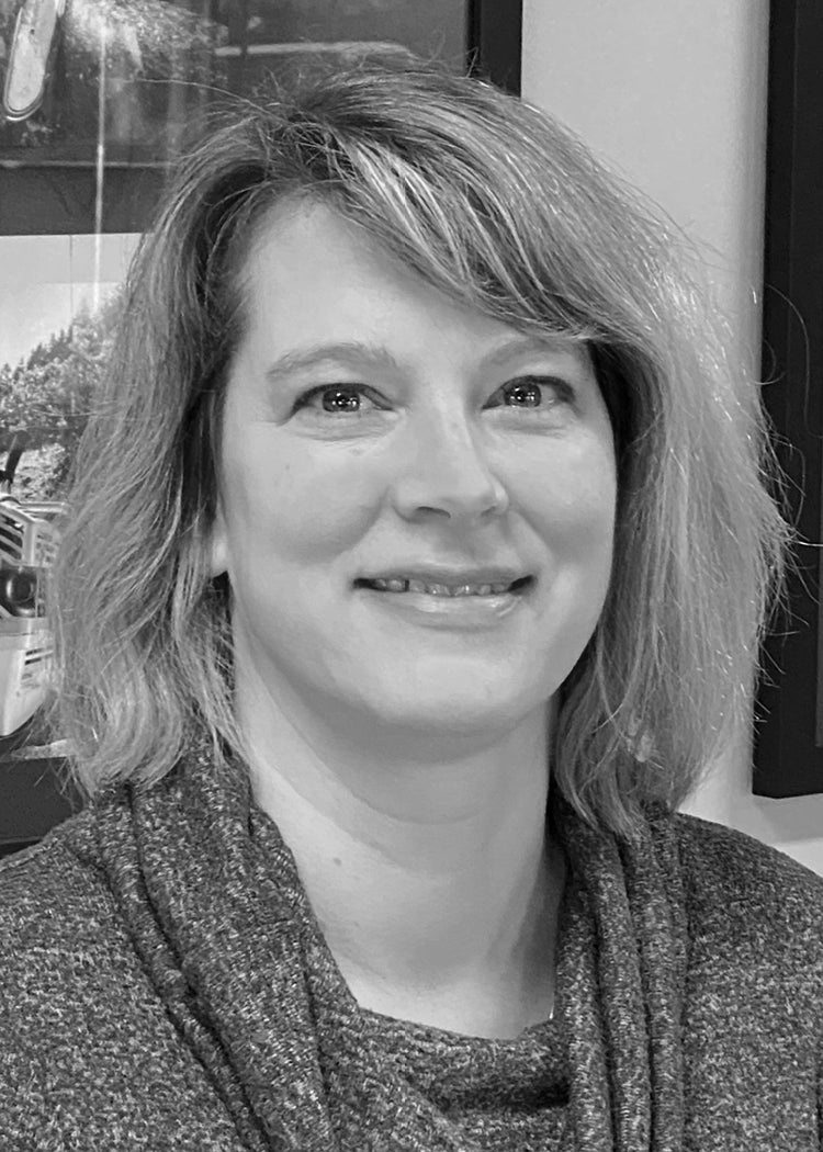 Headshot of a Woman named Mel Stuart.