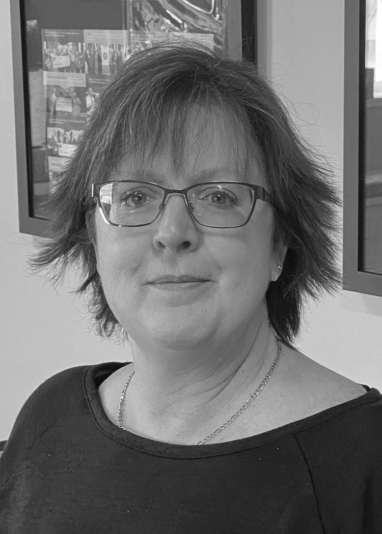 Headshot of a woman named Suzanne Dzyngel.